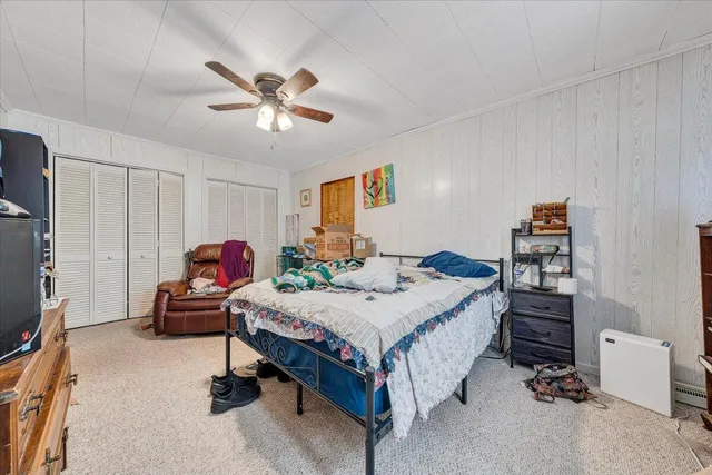 a bathroom with a sink a toilet and bathtub