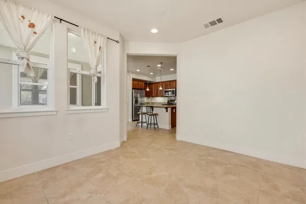 a view of a hallway with a room