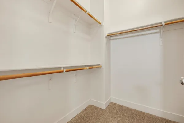 a view of small space with racks on the wall