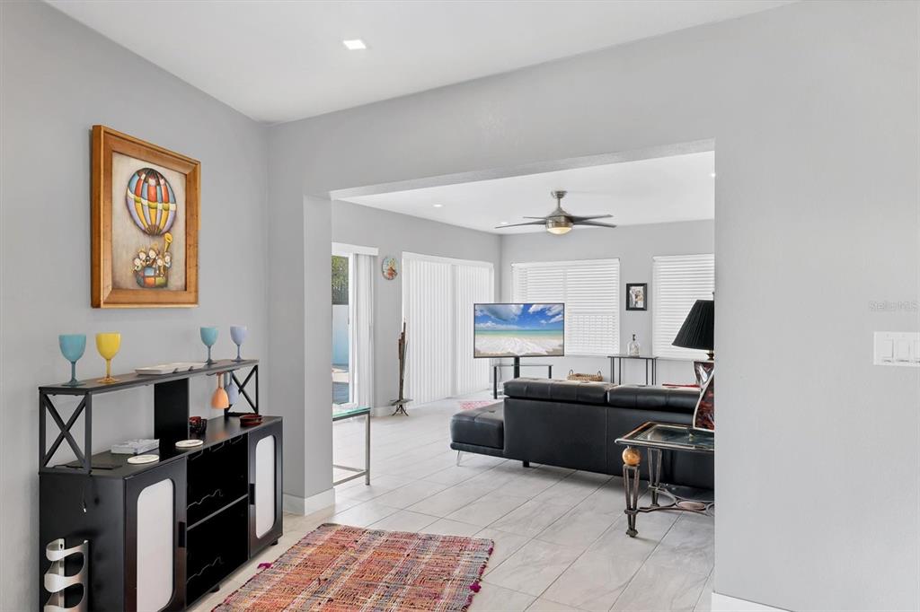 7985 Manasota Key Road Englewood, FL 34223 - Photo 49 of 83 a view of a workspace with furniture and a window