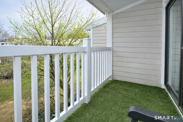 a view of a porch with a backyard