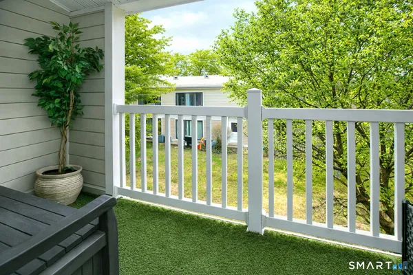 a view of porch with a potted plant