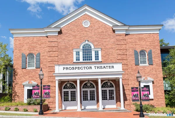 a front view of multi story residential apartment building