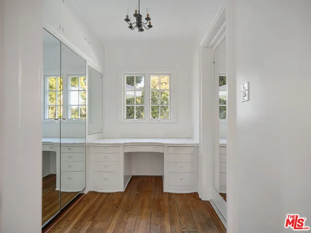 a view of an empty walk in closet