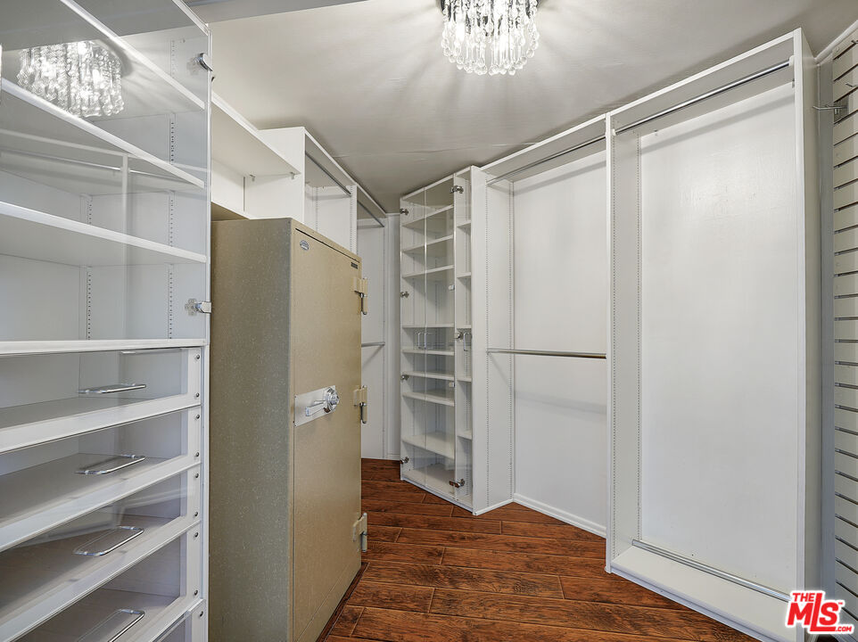 13161 Addison Street Sherman Oaks, CA 91423 - Photo 17 of 34 a view of an empty walk in closet