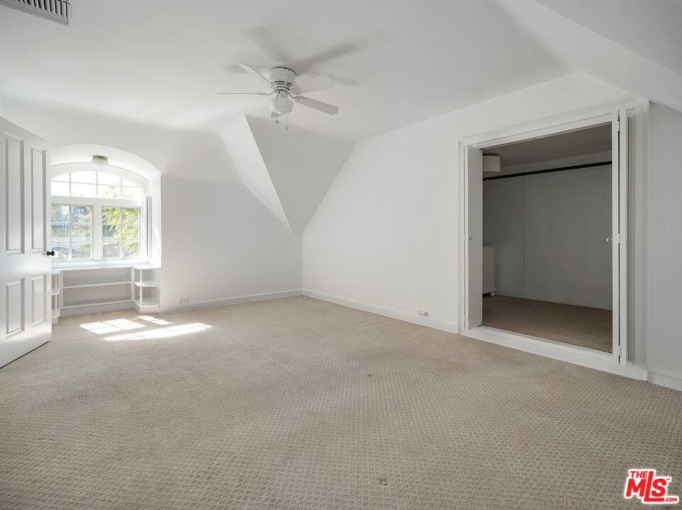 13161 Addison Street Sherman Oaks, CA 91423 - Photo 25 of 34 an empty room with a empty space and windows