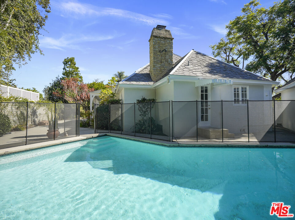 13161 Addison Street Sherman Oaks, CA 91423 - Photo 32 of 34 a view of a house with a yard