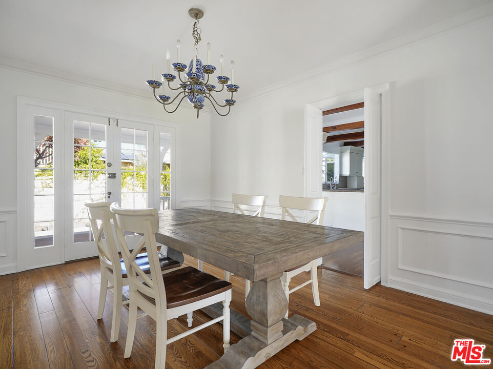 13161 Addison Street Sherman Oaks, CA 91423 - Photo 9 of 34 a view of a dining room with furniture and wooden floor