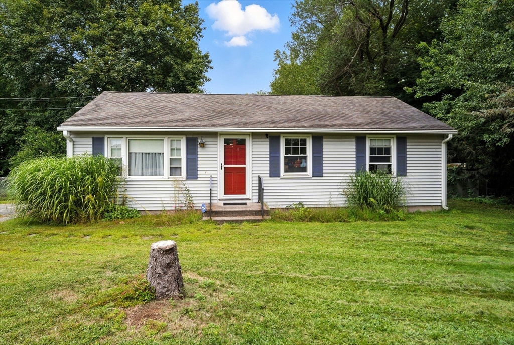 263 Cooley Street Springfield, MA 01128 - Photo 1 of 20 a house view with a garden space