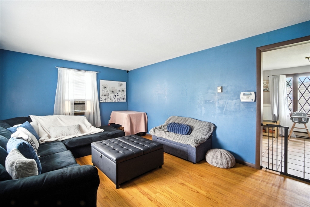 263 Cooley Street Springfield, MA 01128 - Photo 12 of 20 a living room with furniture and a couch