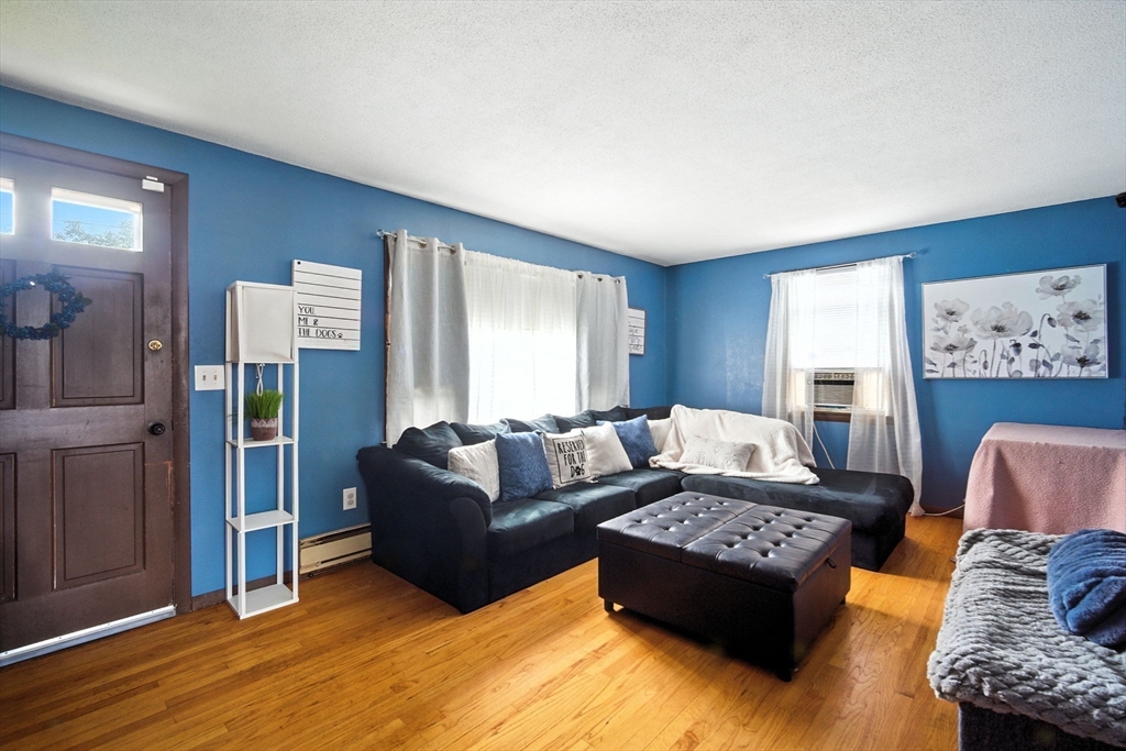 263 Cooley Street Springfield, MA 01128 - Photo 13 of 20 a living room with furniture and a couch