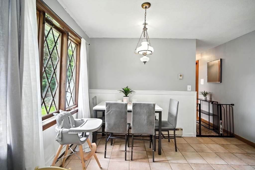 263 Cooley Street Springfield, MA 01128 - Photo 17 of 20 a view of a dining room with furniture window and outside view