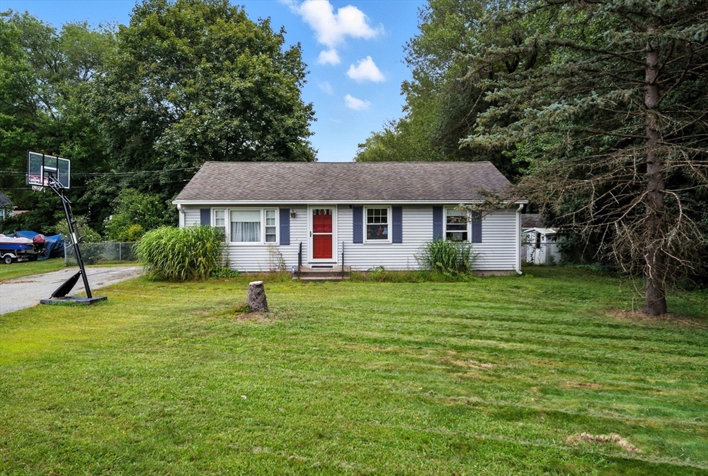 263 Cooley Street Springfield, MA 01128 - Photo 2 of 20 a view of a house with a backyard