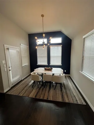 a room with a book shelf and a shelf