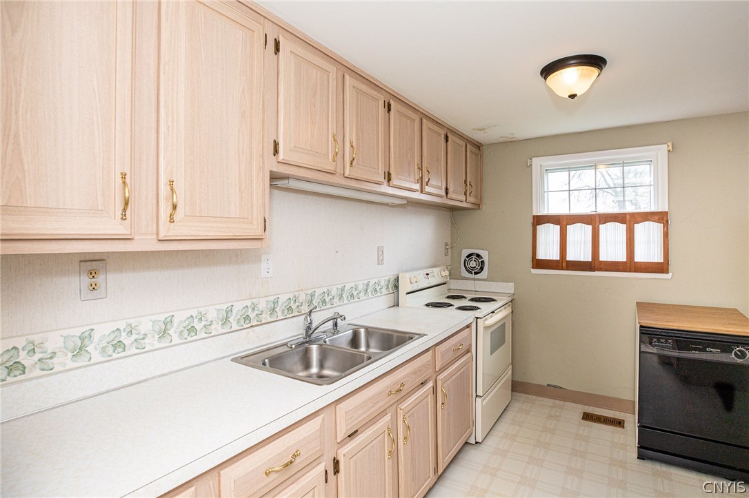 8003 Bamm Hollow Road Clay, NY 13041 - Photo 12 of 35 Alternate view of the kitchen. Sweet shutters all