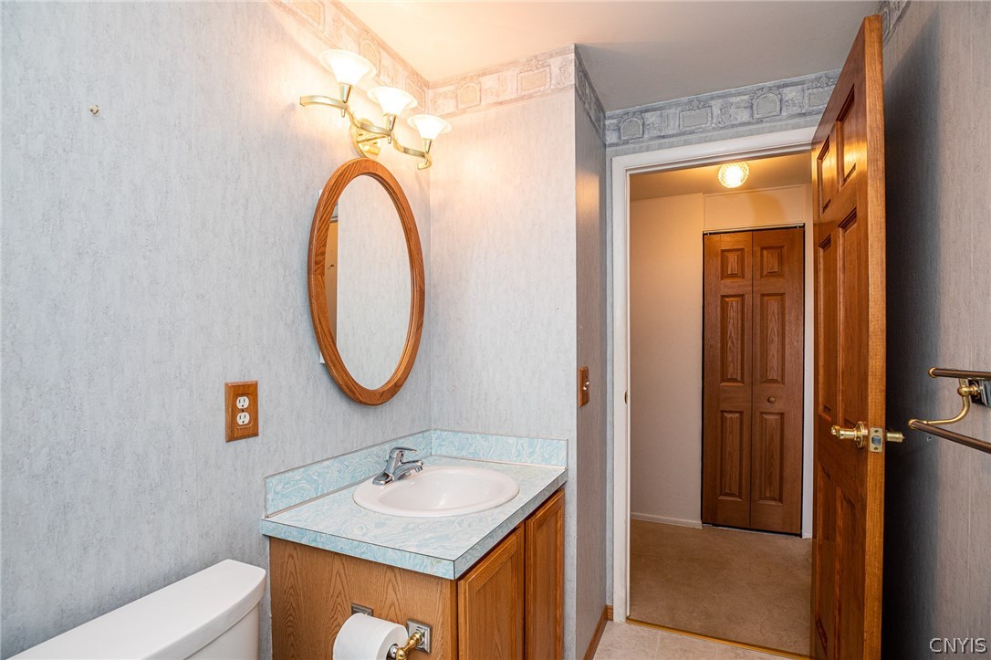 8003 Bamm Hollow Road Clay, NY 13041 - Photo 15 of 35 Lots of storage space and bright color make the ba