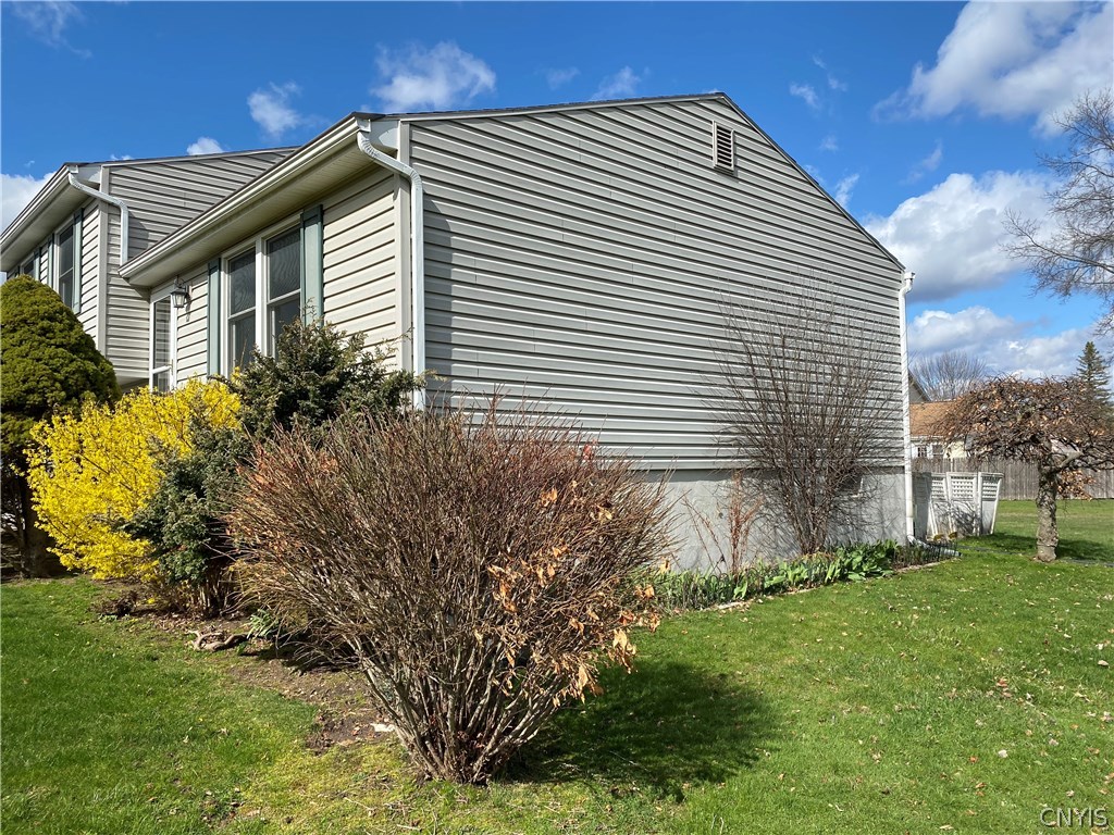 8003 Bamm Hollow Road Clay, NY 13041 - Photo 4 of 35 Right side of home-easy and carefree landscaping m