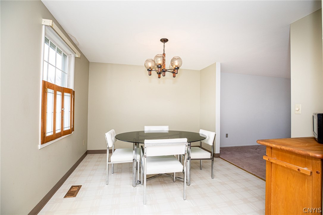 8003 Bamm Hollow Road Clay, NY 13041 - Photo 10 of 35 View from kitchen of dining area.