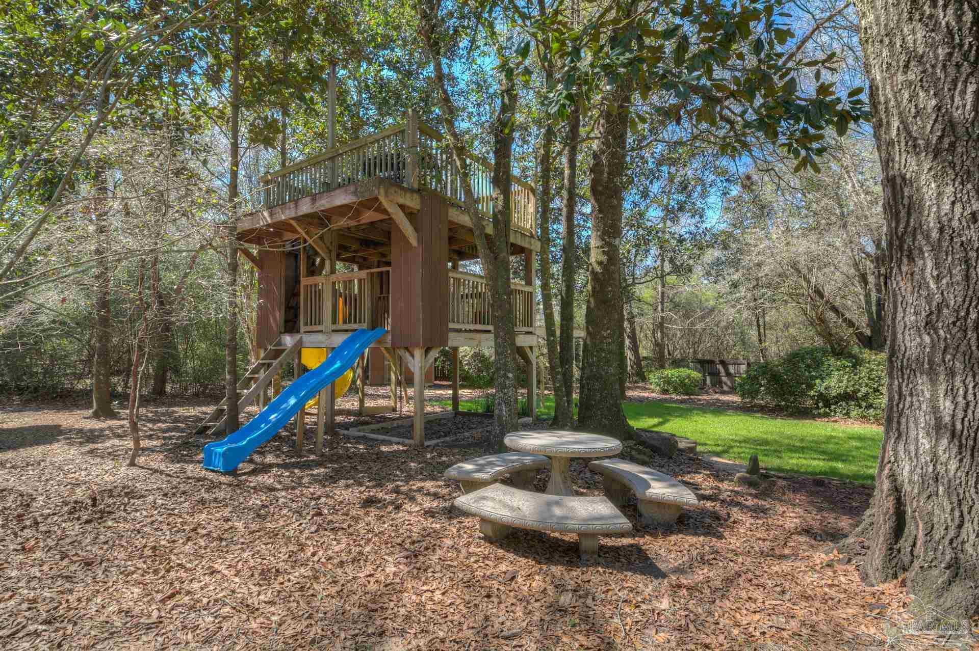 4917 Shell Road Milton, FL 32570 - Photo 40 of 49 a view of a park with slide