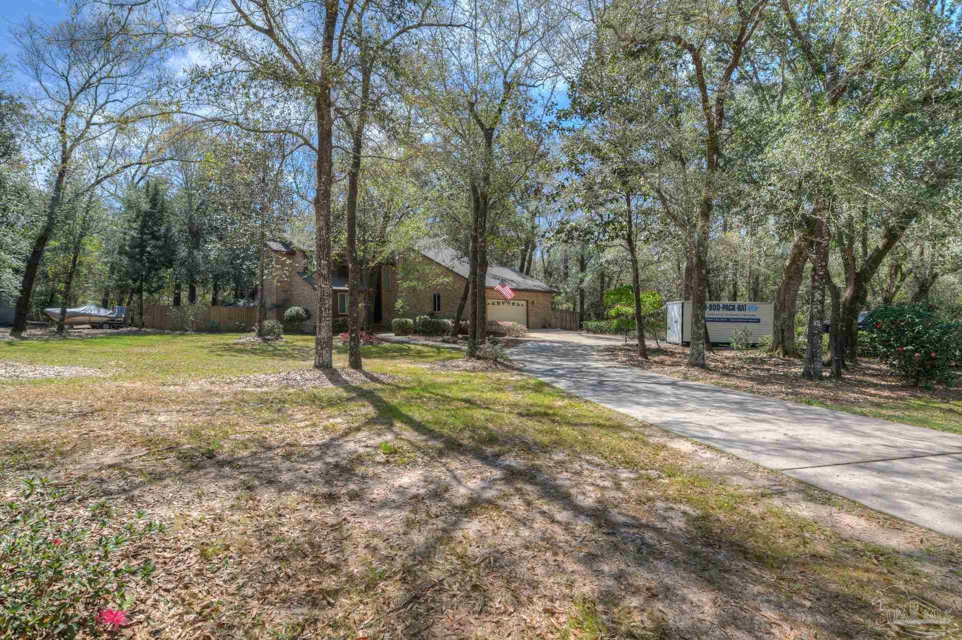 4917 Shell Road Milton, FL 32570 - Photo 5 of 49 a view of outdoor space with trees all around