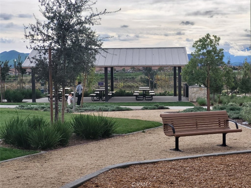 4233 East Rincon Street Ontario, CA 91761 - Photo 18 of 20 a patio with table and chairs
