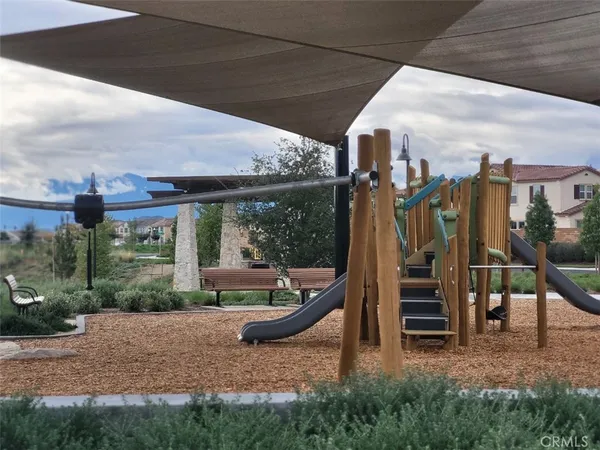 a view of a swimming pool with a yard