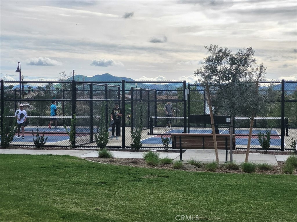 4233 East Rincon Street Ontario, CA 91761 - Photo 20 of 20 a view of a swimming pool with a yard