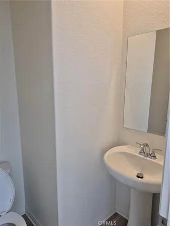 a bathroom with a sink and a toilet