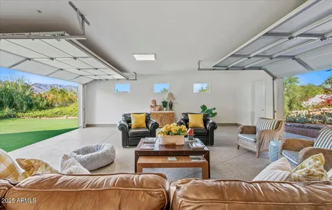 a view of an entryway with fire pit