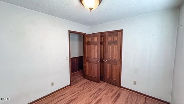 104 Baldwin Circle Garner, NC 27529 - Photo 15 of 20 a view of a hallway with wooden floor