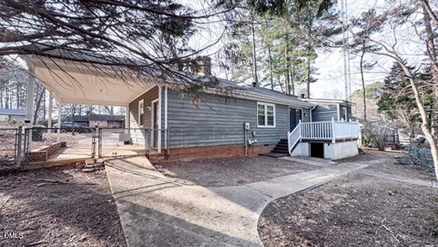 104 Baldwin Circle Garner, NC 27529 - Photo 5 of 20 a view of a house with a patio and a yard