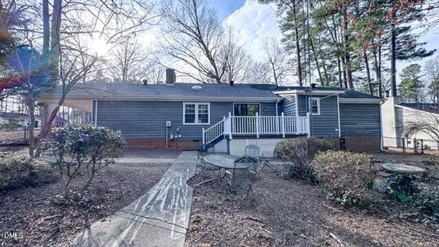 104 Baldwin Circle Garner, NC 27529 - Photo 6 of 20 a view of house with a backyard and chairs