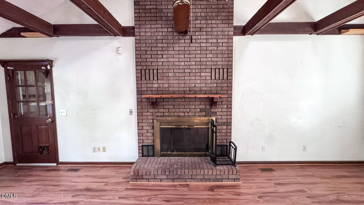 104 Baldwin Circle Garner, NC 27529 - Photo 8 of 20 a view of a fireplace