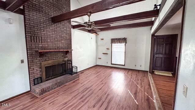 104 Baldwin Circle Garner, NC 27529 - Photo 9 of 20 a view of empty room with wooden floor and fireplace