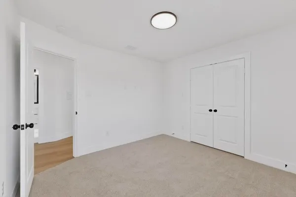 a view of a room with an empty space