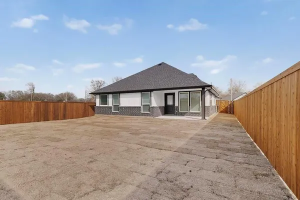 a house with yard in front of it