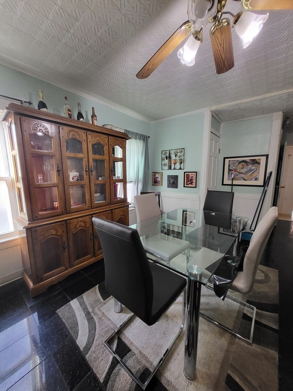 315 Main Street Everett, MA 02149 - Photo 23 of 37 a view of a livingroom with furniture hardwood floor and workspace