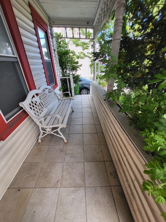 315 Main Street Everett, MA 02149 - Photo 3 of 37 a view of balcony with furniture