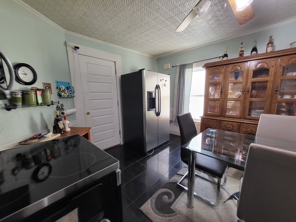315 Main Street Everett, MA 02149 - Photo 5 of 37 a living room with furniture and a window