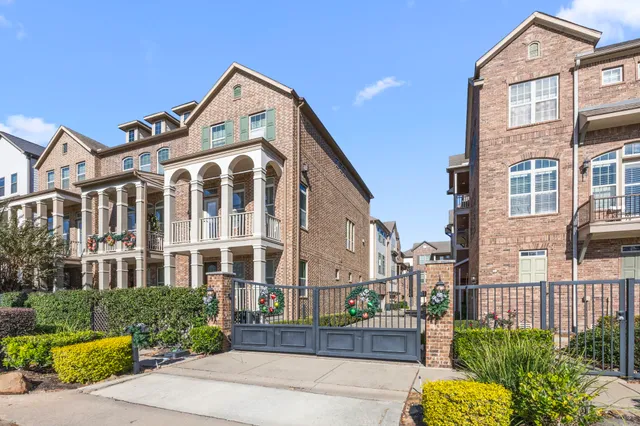 a front view of a building with garden