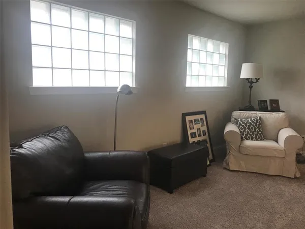a kitchen with granite countertop a stove and a sink