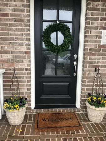 a view of backyard with outdoor seating