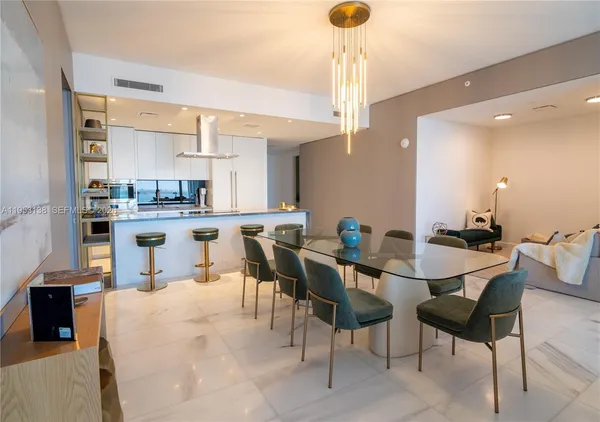 a view of a dining room with furniture