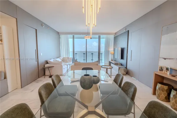 a room with furniture and a mirror