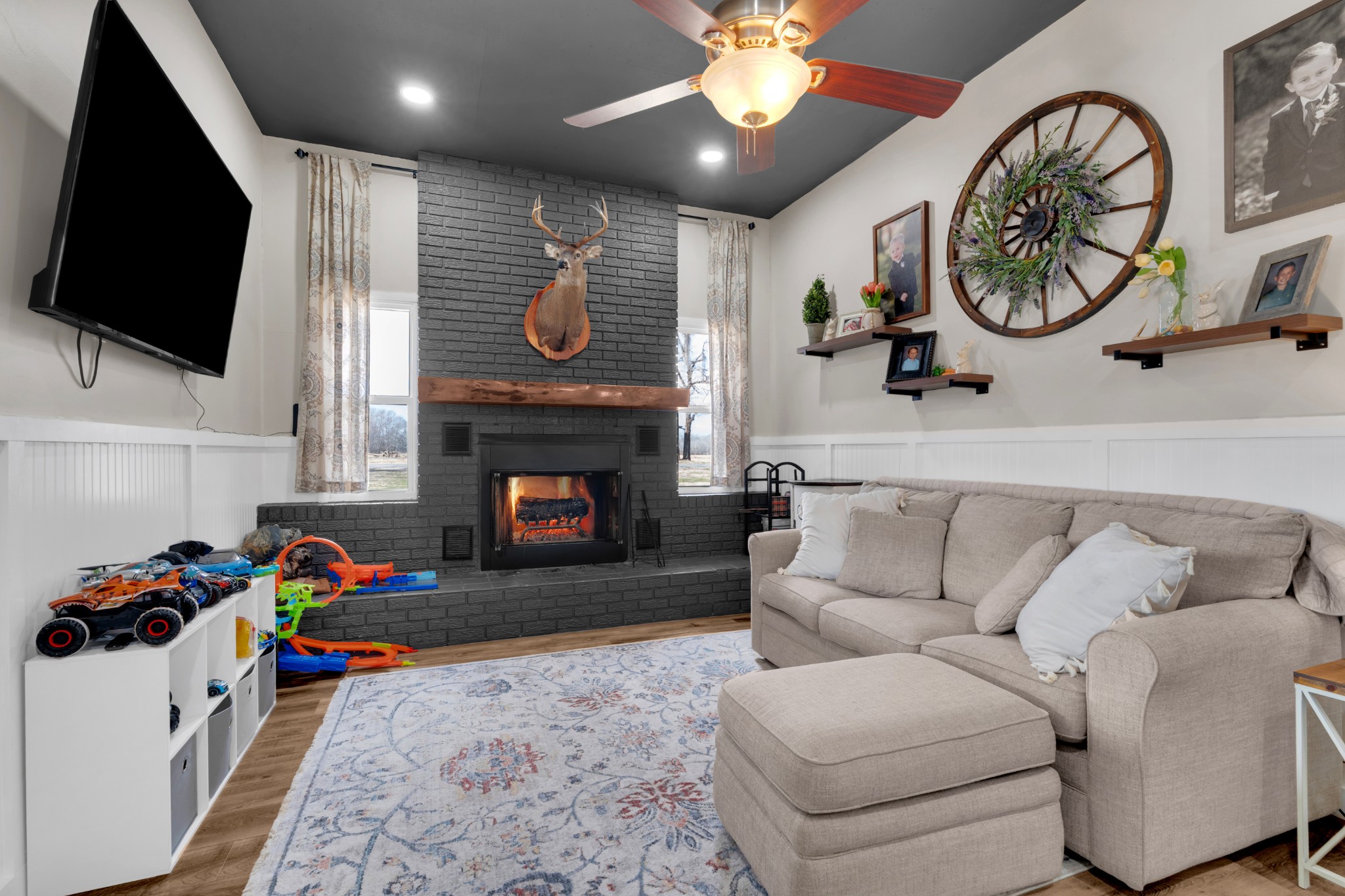 52 Hotel Road Flintville, TN 37335 - Photo 18 of 48 a living room with furniture a flat screen tv and a fireplace