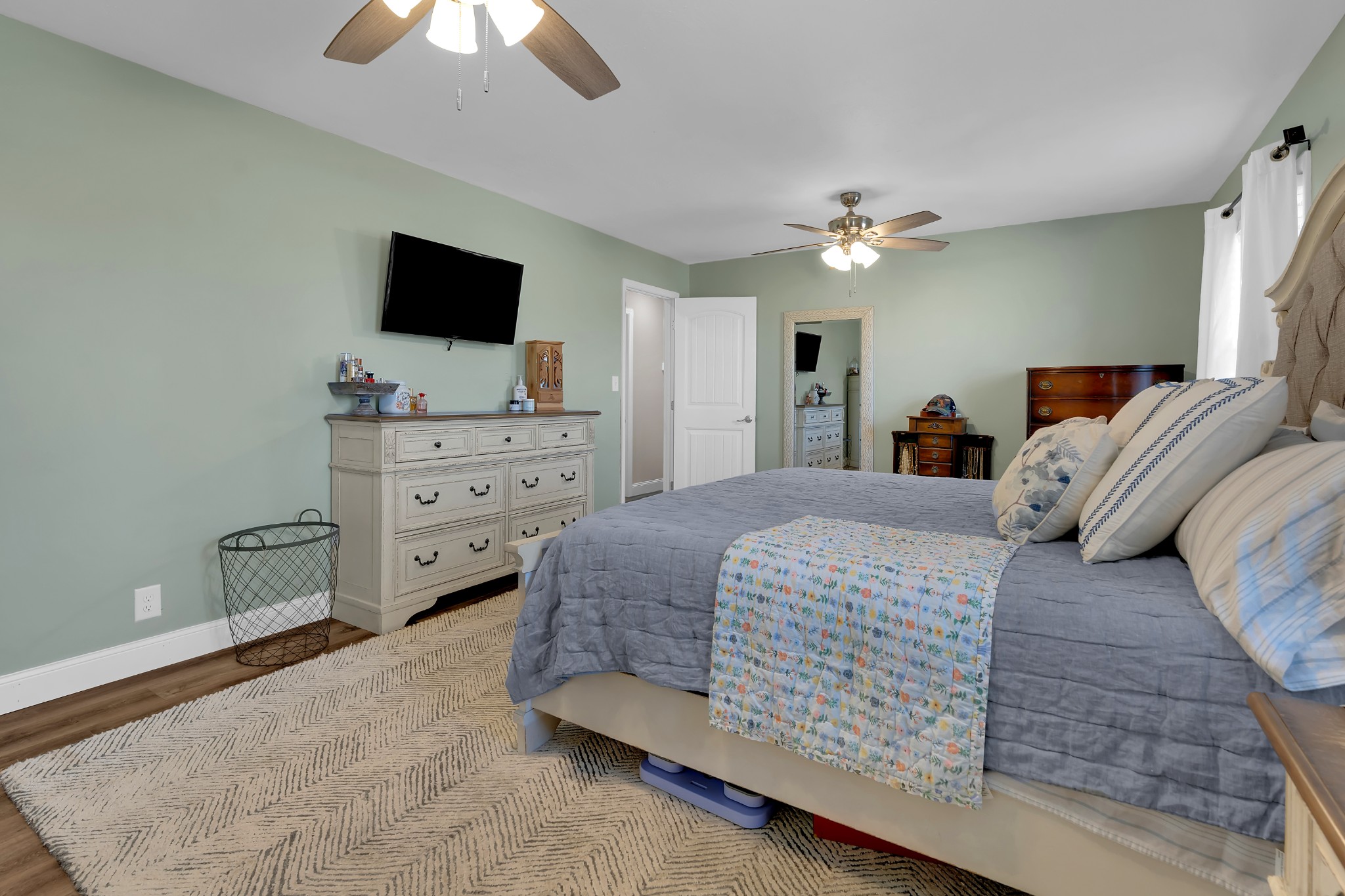 52 Hotel Road Flintville, TN 37335 - Photo 22 of 48 a bedroom with a bed and a flat screen tv