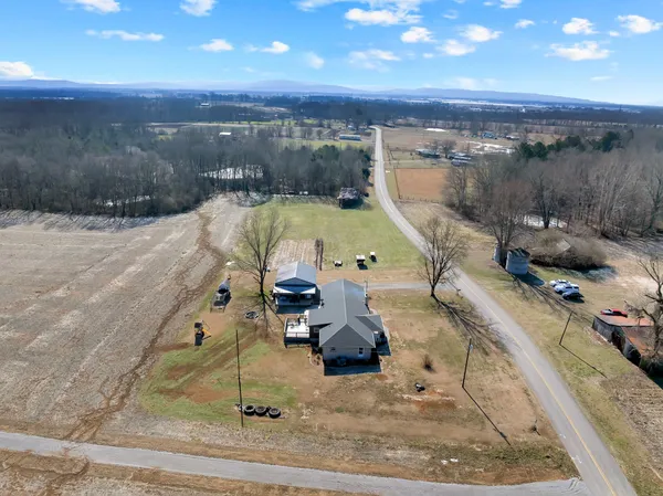 a view of a swimming pool and an outdoor space