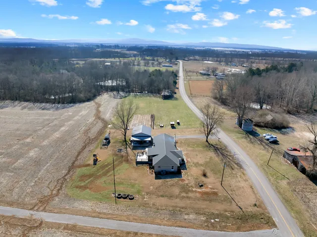 a view of a swimming pool and an outdoor space