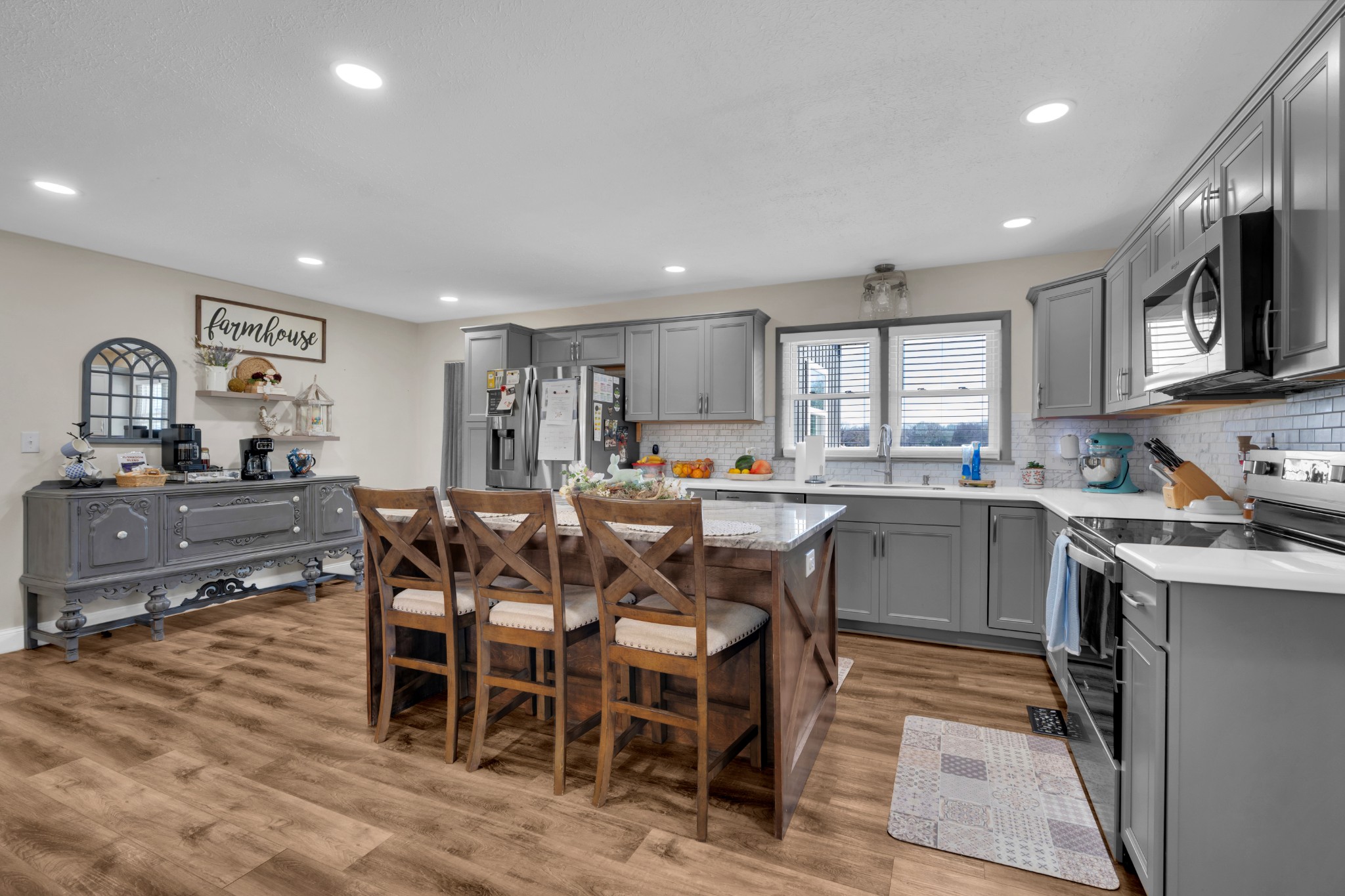 52 Hotel Road Flintville, TN 37335 - Photo 7 of 48 a kitchen with lots of wooden furniture a sink appliances and cabinets