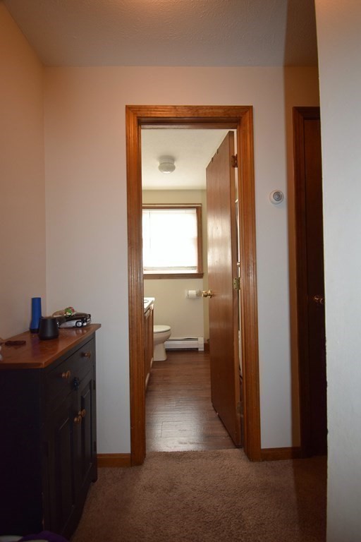 230 Chester Road Fremont, NH 03044 - Photo 15 of 30 a view of a hallway with a closet